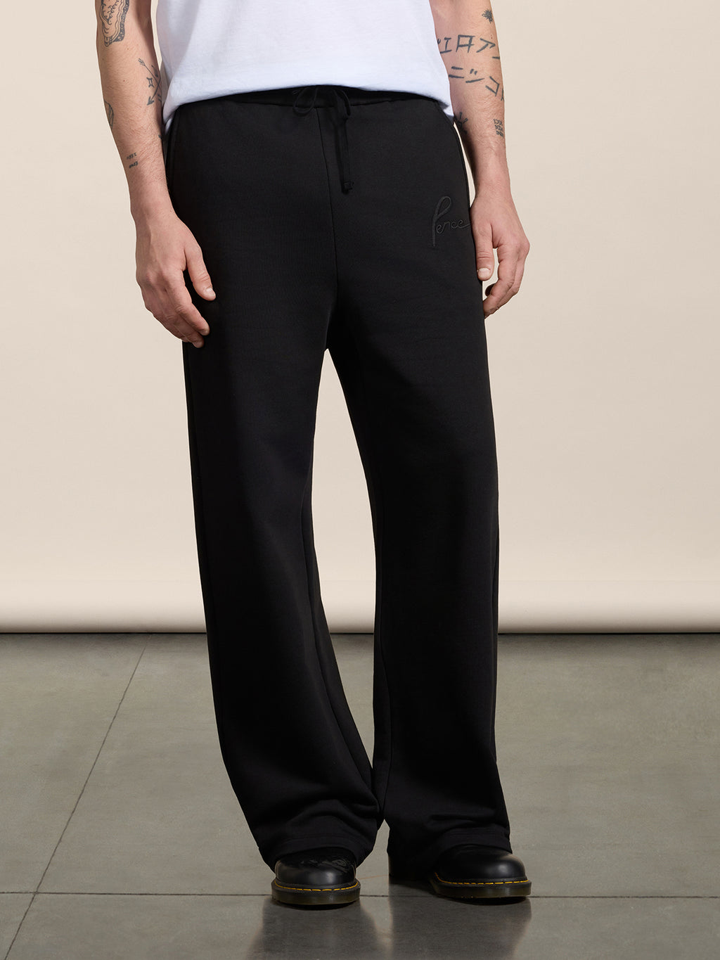 LOOSE-FIT TROUSERS IN BLACK COTTON FLEECE WITH EMBROIDERY - BLACK - Men′s Bottomwear | Pence 1979