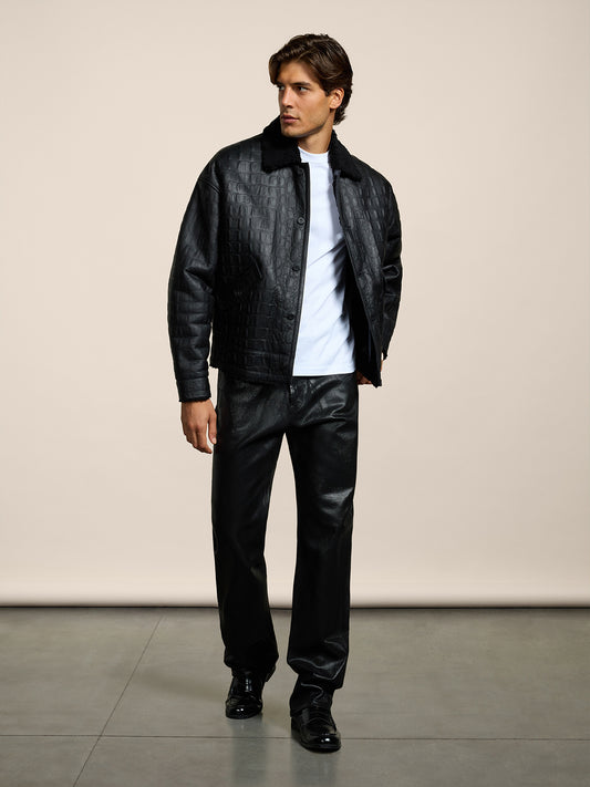 PANTALONE 5 TASCHE DA UOMO LOOSE FIT IN DENIM CON SPALMATURA METALLICA COLORE NERO - NERO - Abbigliamento Uomo | Pence 1979