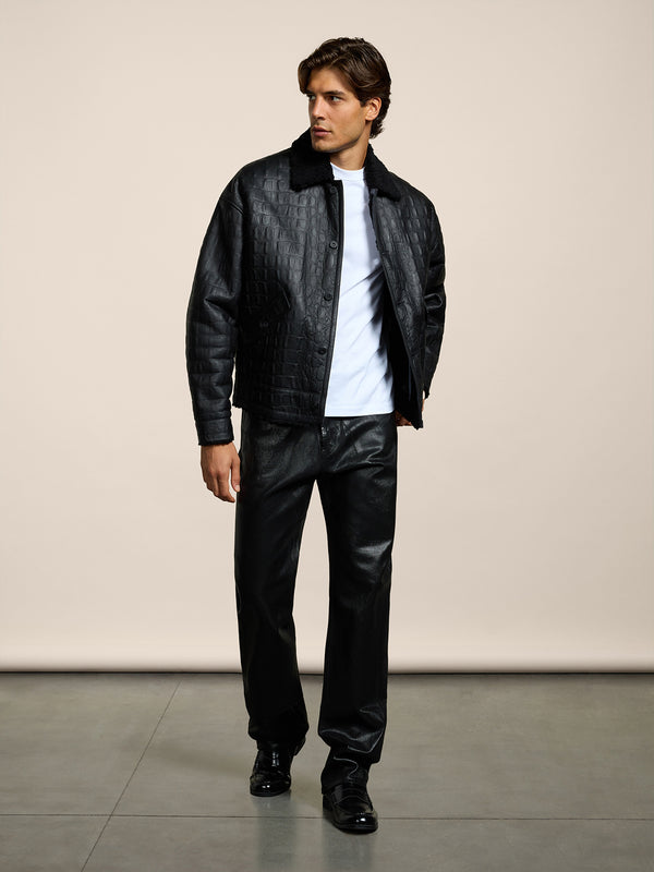 PANTALONE 5 TASCHE DA UOMO LOOSE FIT IN DENIM CON SPALMATURA METALLICA COLORE NERO - NERO - Abbigliamento Uomo | Pence 1979