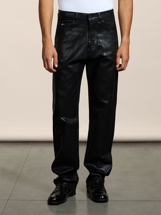 PANTALONE 5 TASCHE DA UOMO LOOSE FIT IN DENIM CON SPALMATURA METALLICA COLORE NERO - NERO - Abbigliamento Uomo | Pence 1979