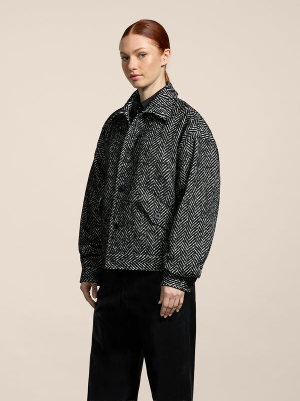 GIUBBINO UNISEX OVER FIT, FONDO ELASTICATO, SPINATO COLORE BIANCO E NERO - NERO/BIANCO HERRINGBONE - Abbigliamento Donna | Pence 1979